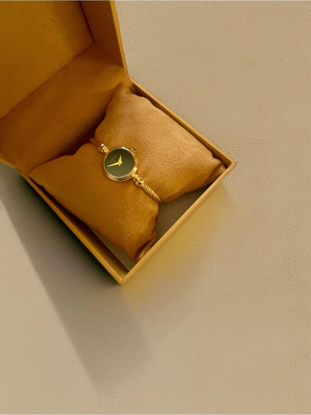 Gucci Gold-Tone Bangle Watch with Black Dial - Picture 16 of 17